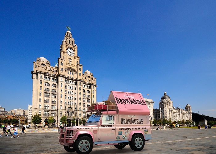 Liverpool, United Kingdom - June 11, 2015: The Three Graces consisting of the Liver Building, Port of Liverpool Building and the Cunard Building with tourists enjoying the sights, Liverpool, Merseyside, England, UK, Western Europe.