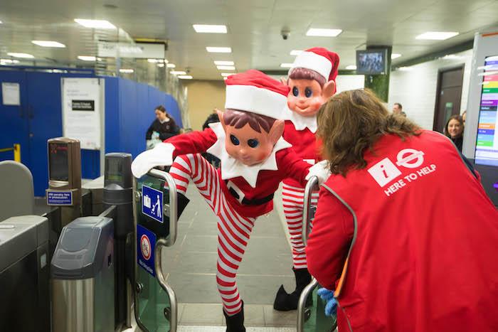 EDITORIAL USE ONLY TFL staff member Zelis with Elfie and Elvie from UK toy brand Elves Behaviní Badly who were causing mischief around London in the run up to Christmas. PA Photo. Picture date: Monday November 25, 2019. The naughty elves are asking parents and children to prank their friends, family and co-workers with their own elf dolls this year and post them online with the hashtag #NoElfControl. The festive doll range, which launched in 2017, has sold around 5 million elves to date. Photo credit should read: David Parry/PA Wire