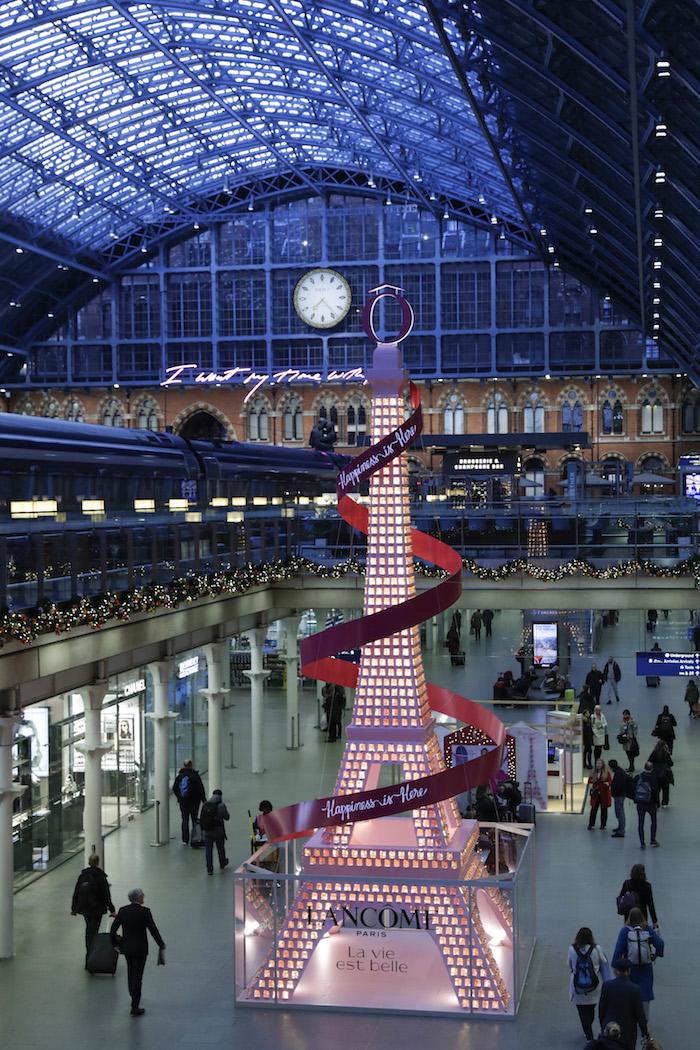 LONDON, ENGLAND - NOVEMBER 12: LancÙme unveil their 2019 festive installation at St. Pancras International, delighting passers-by with the 36ft sparkling sensation, inspired by Paris' most iconic landmark - The Eiffel Tower on November 12, 2019 in London, England. (Photo by John Phillips/Getty Images for Lancome)