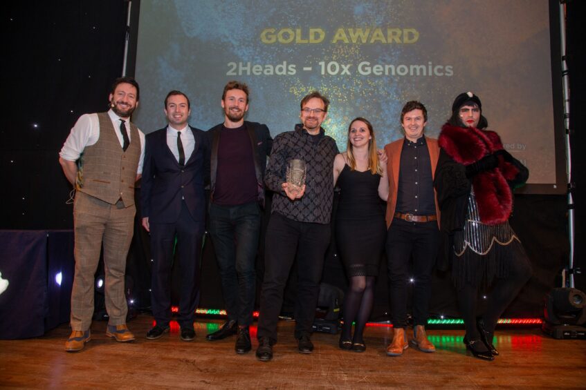 Photo by Aniseed. Bowimi's Dan Ghadimi presents the award to 2 Heads